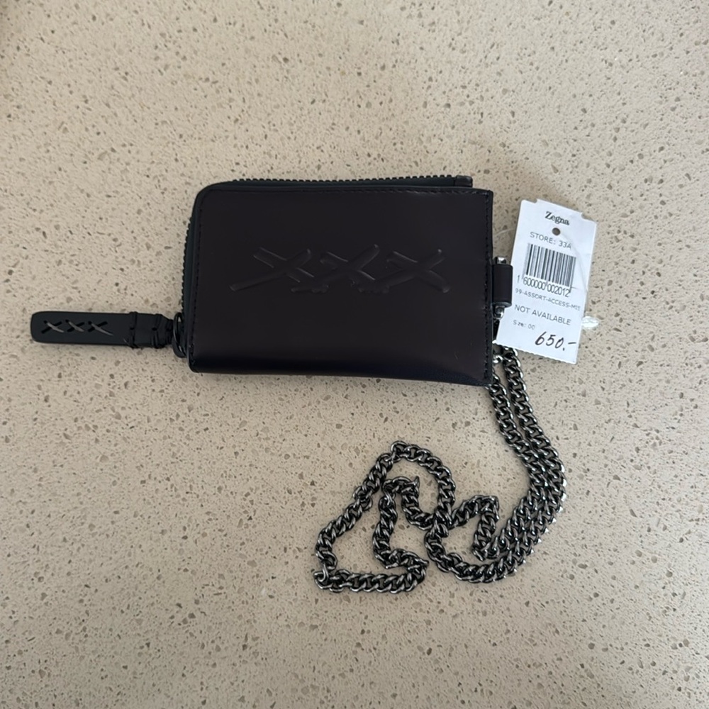 ERMENEGILDO ZEGNA
Black Xxx Embossed Leather Continental zipper wallet